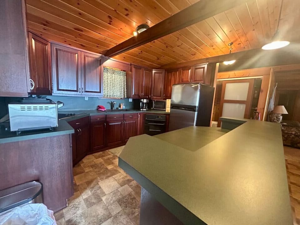 Full stocked open kitchen to cook and enjoy a meal with family & friends. Plenty of counter space!