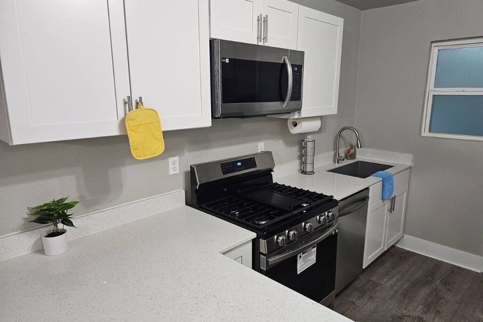 The full kitchen, with all of the utensils you could need to cook a hearty meal.