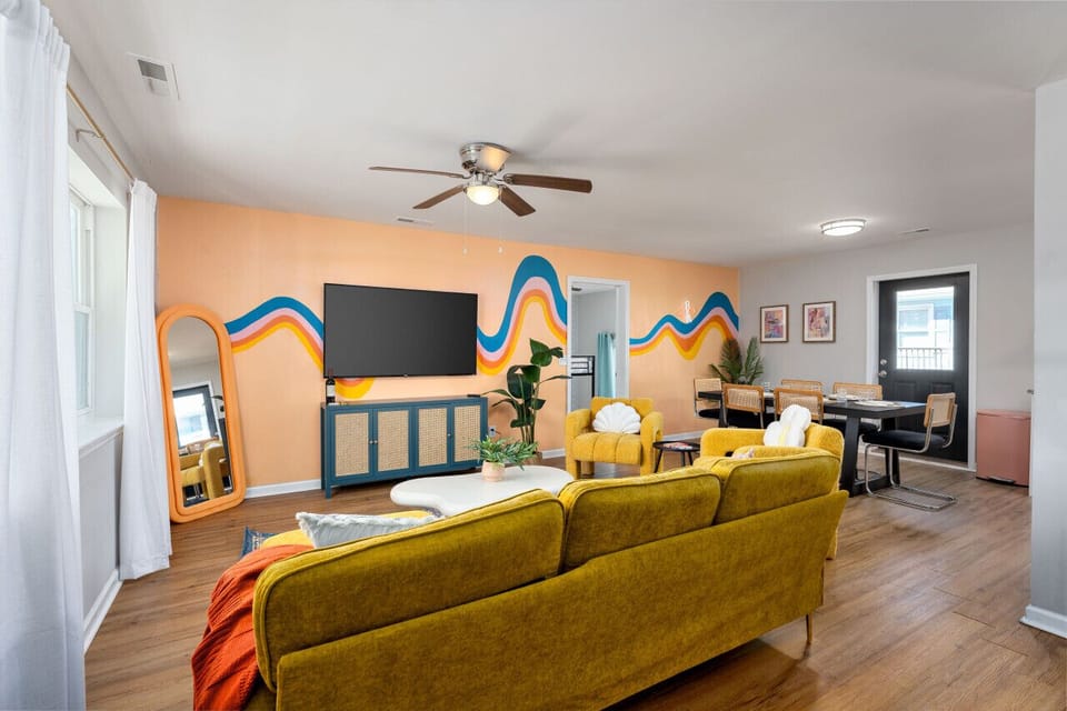 Stunning family room showcasing our hand-painted mural!