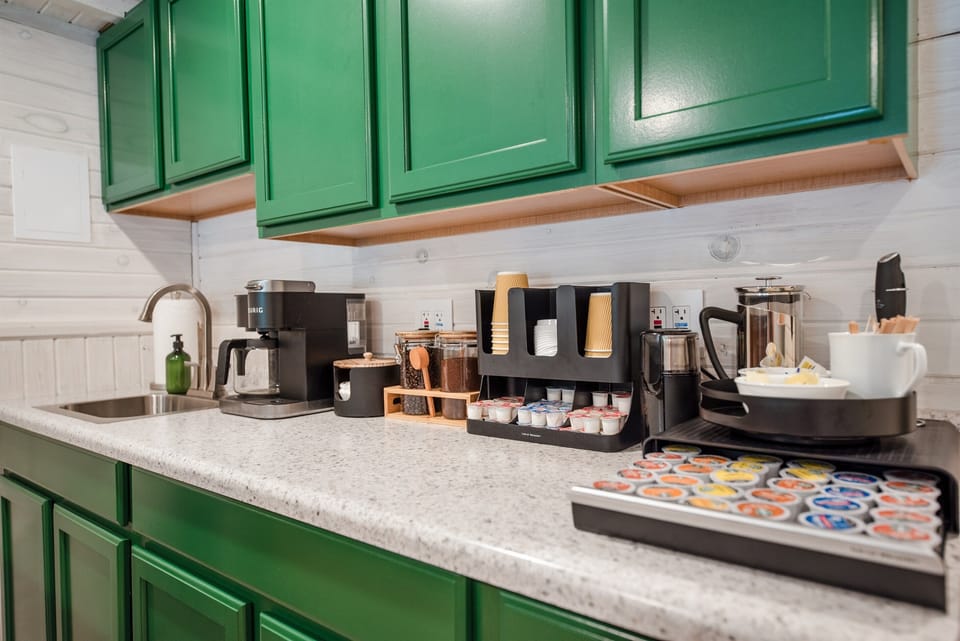 Start your day off right at the fully-loaded coffee bar. Enjoy your choice of drip, k cup, or French press style, ground or whole bean coffee, grinder, frother, and countless flavors of k-cups and creamers.