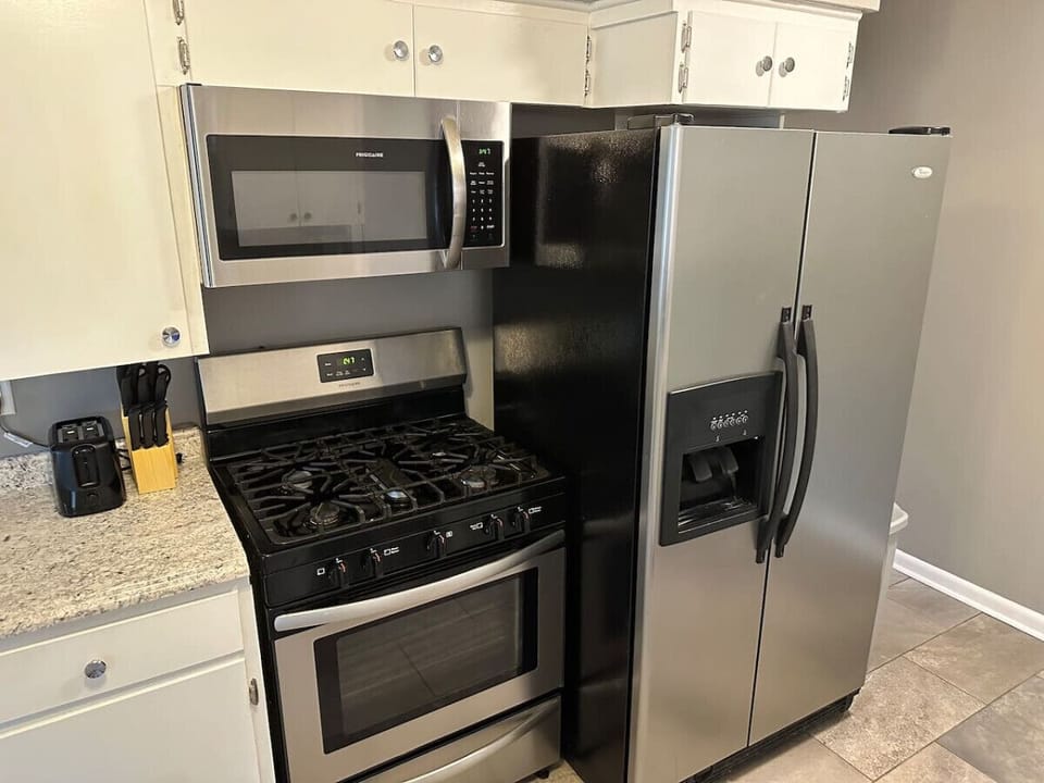 Fully equipped kitchen with stainless steel appliances