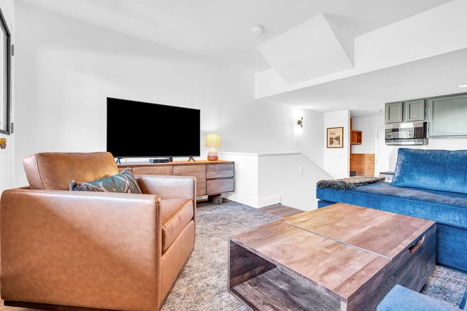 Discover the perfect blend of versatility and comfort with our pull-out couch, effortlessly transforming into a full-size bed. Enjoy entertainment on our smart TV for an unforgettable stay.