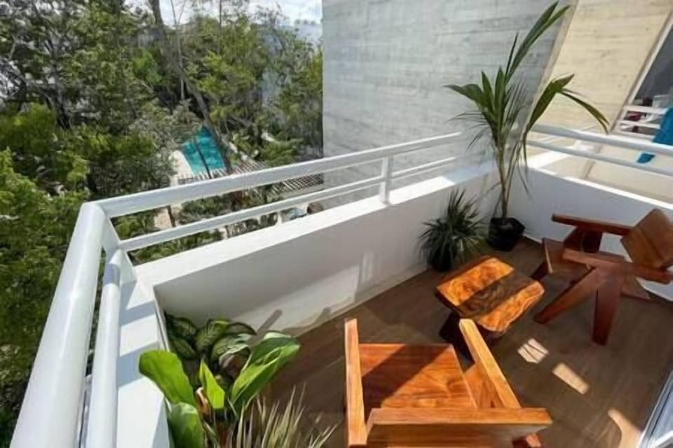 Private balcony: Stunning pool views, serene oasis.