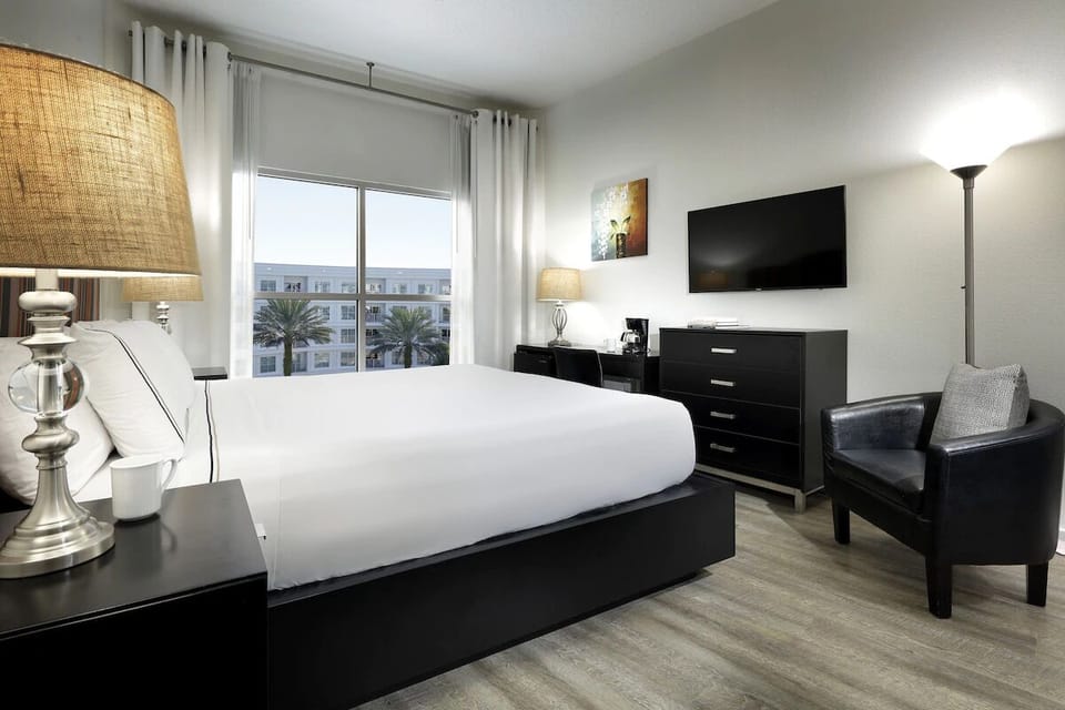 Drift off in a calm, minimalist king bedroom.