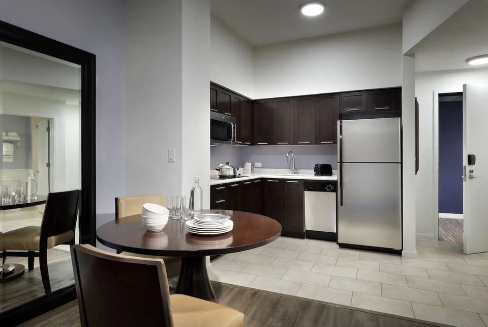 Gather for easy meals in a bright, modern kitchen nook.