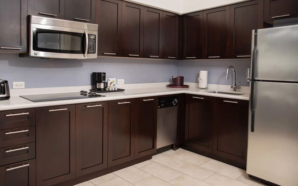 Cook comfortably with full-size appliances and sleek, ample counters.
