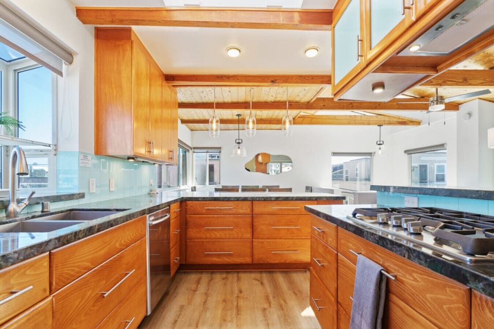 Savor the flavors of the coast in our fully stocked, stylish kitchen—where culinary inspiration meets sea views.