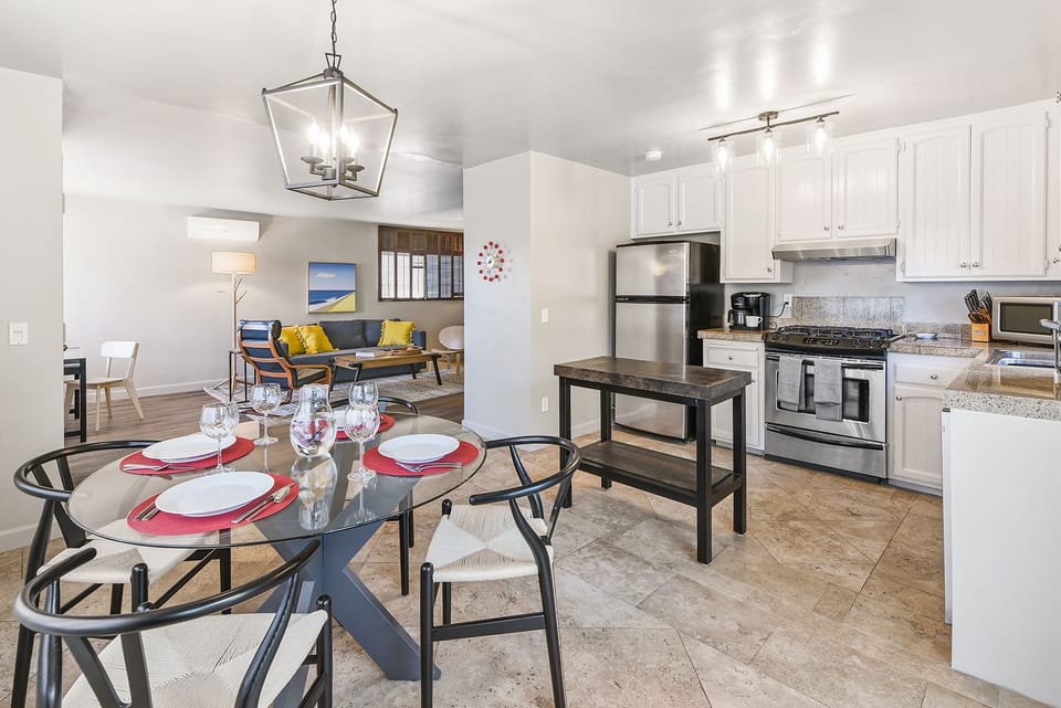 The dining area is conveniently located off the kitchen, offering plenty of space to enjoy meals together.