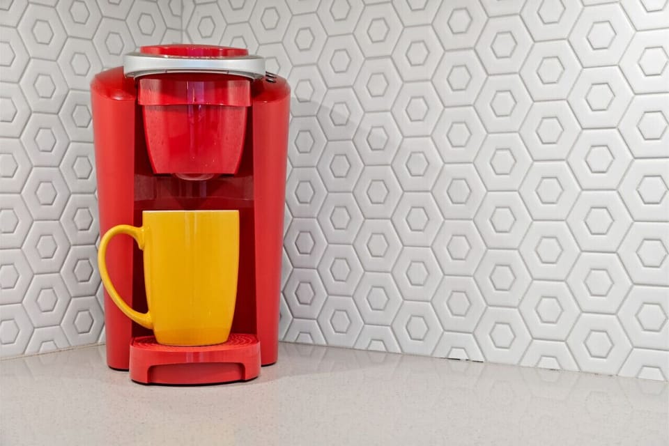 Conveniently brew your favorite beverages with the coffee maker in the well-appointed kitchen, adding a touch of comfort and ease to your morning routine.