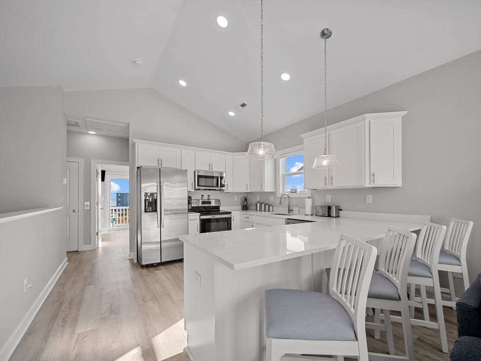 Kitchen with bar seating for 4.