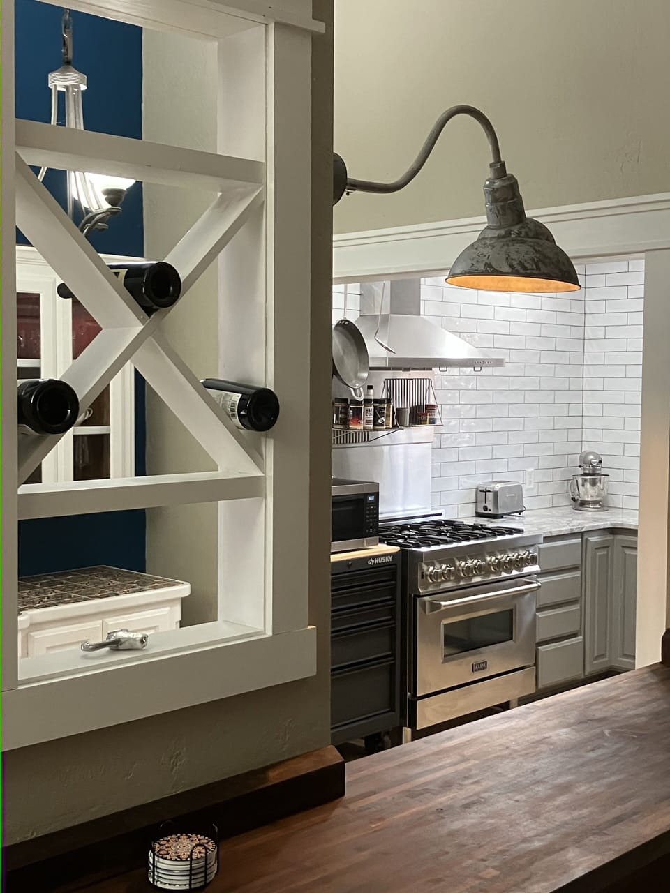Wine rack and modern kitchen with 6 burner z-line range with hood
