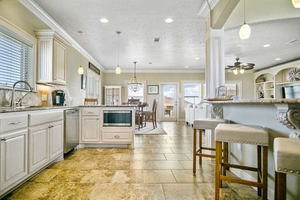 Kitchen is open to the living room for fun family conversations. 
