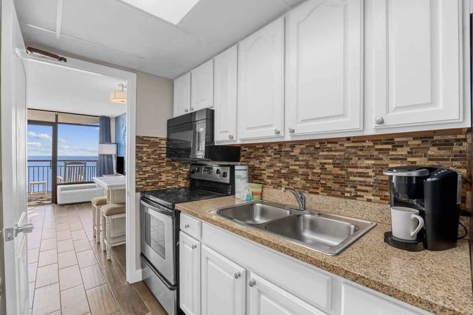 Whether you're cooking or reheating leftovers, this kitchen has you covered.

