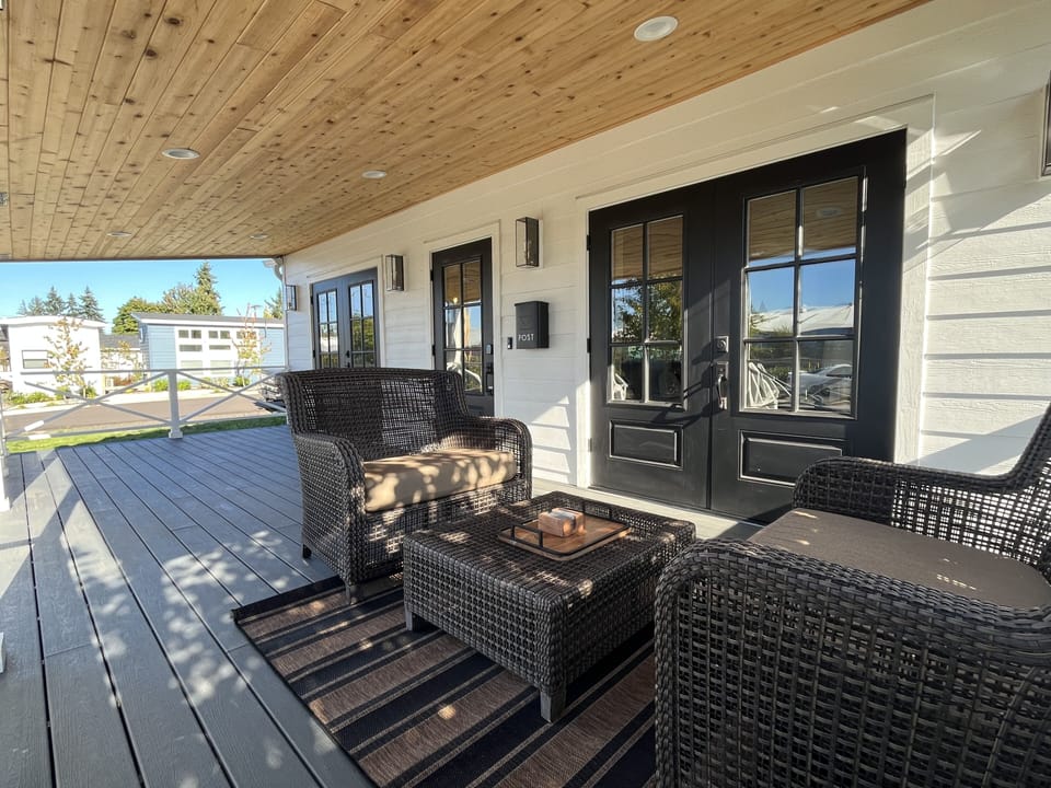 Covered porch with comfortable seating area