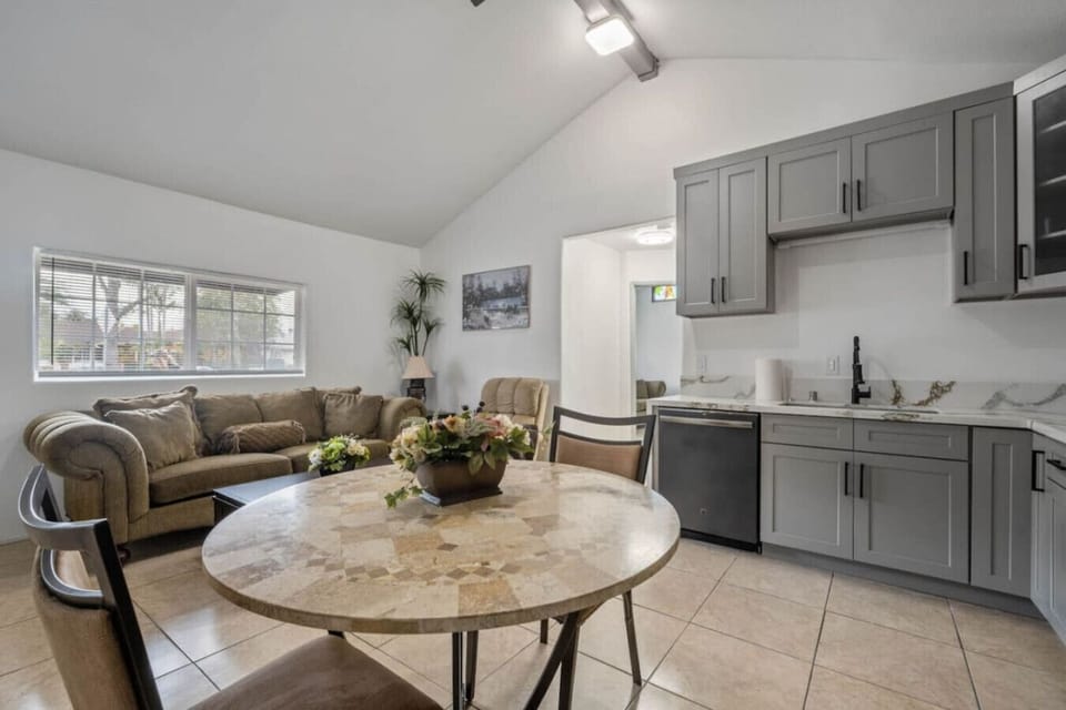 ✨ Stylish and spacious living area with comfortable seating and modern decor.