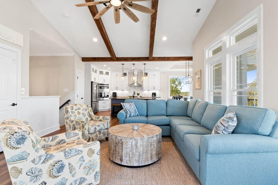 Great Room with Vaulted Ceiling & Beams
