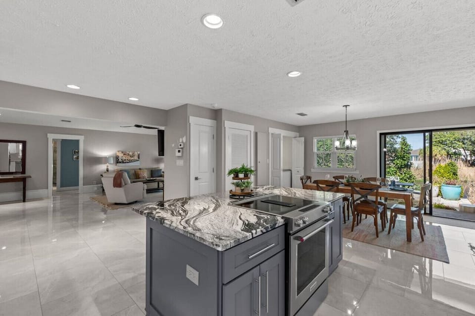 The home boasts abundant marble accents, extending even to the floors.