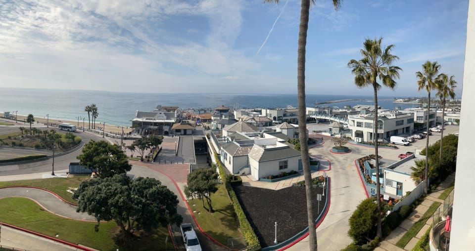 View of beach and pier from back stairwell