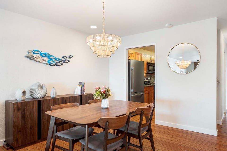 Dining area and kitchen adjacent to the living room.
