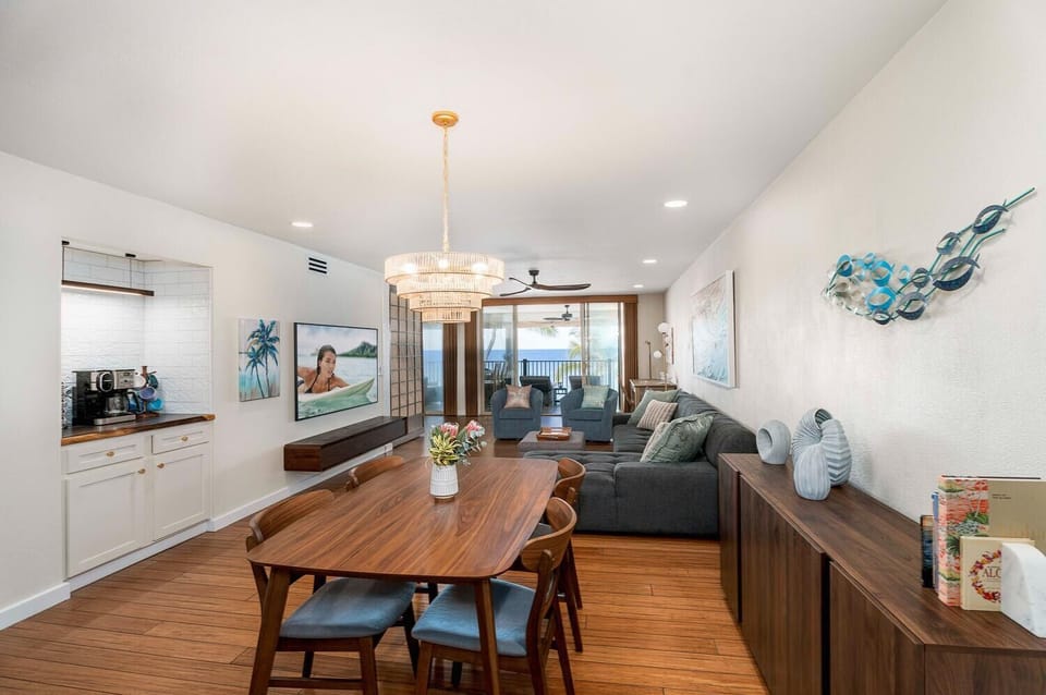 Looking over the dining area and living room onto the lanai.