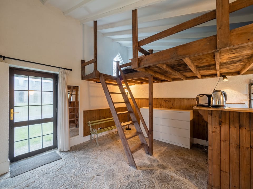 Stairs in kitchen leading to loft style bedroom Ventry Farm Parlour Cottage Ventry County Kerry Ireland