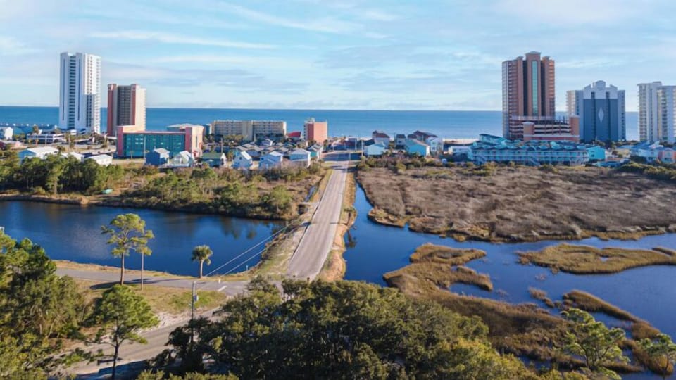 Lani Kai is uniquely positioned between the lagoon & the Gulf of Mexico! You have beautiful views from both sides of the complex as well as green space behind the building next to the lagoon.