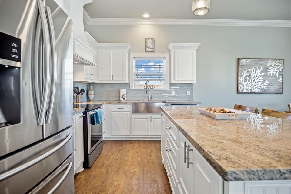 Pineapple Paradise Kitchen: Immerse yourself in coastal charm in this thoughtfully designed kitchen, accented with nautical-inspired decor, weathered wood accents, evoking a sense of seaside serenity.
