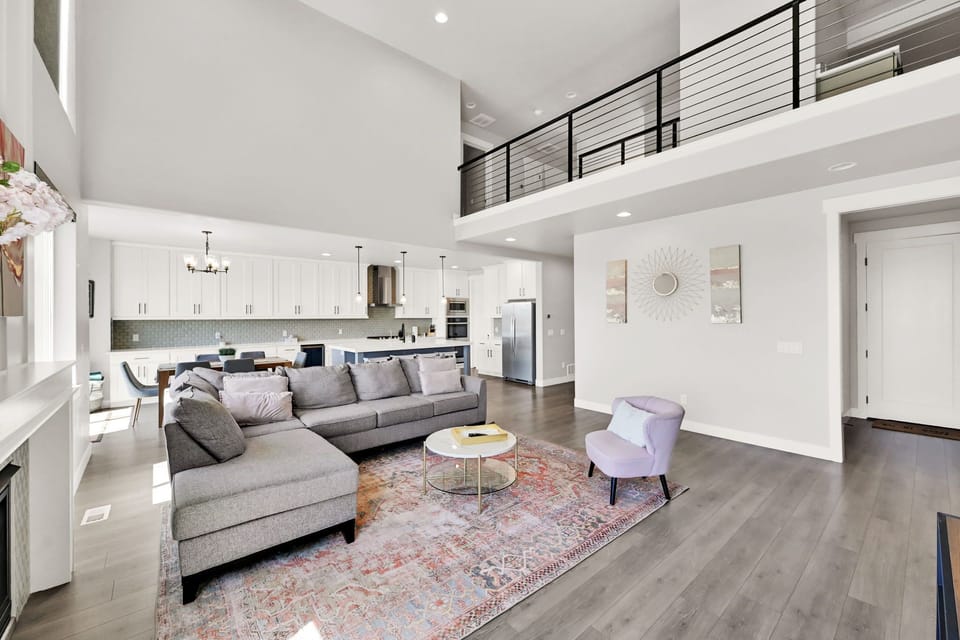Living room and kitchen and entrance from garage