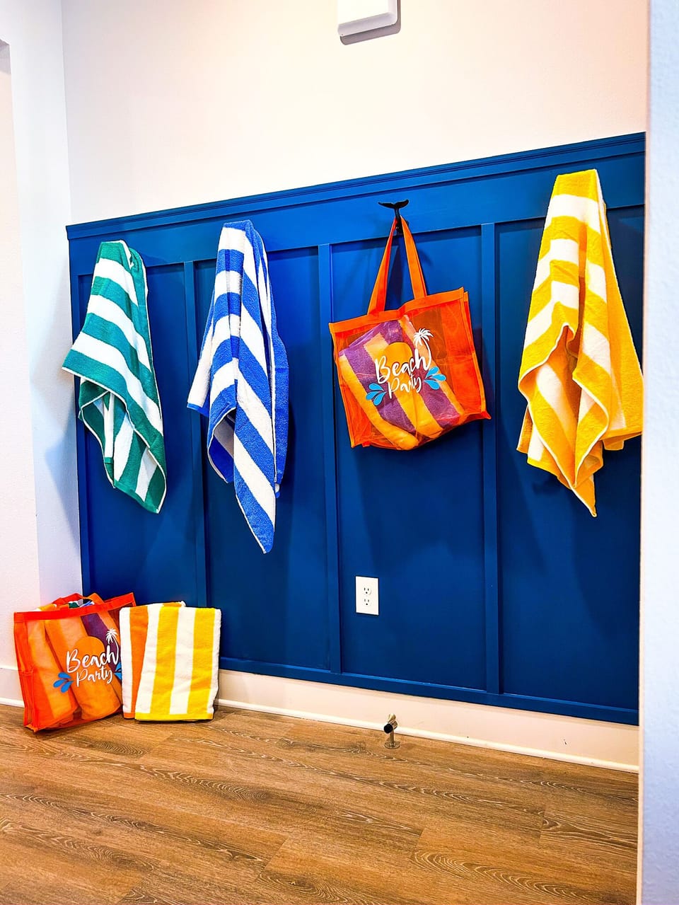 Updated entry with hooks for your beach bags.