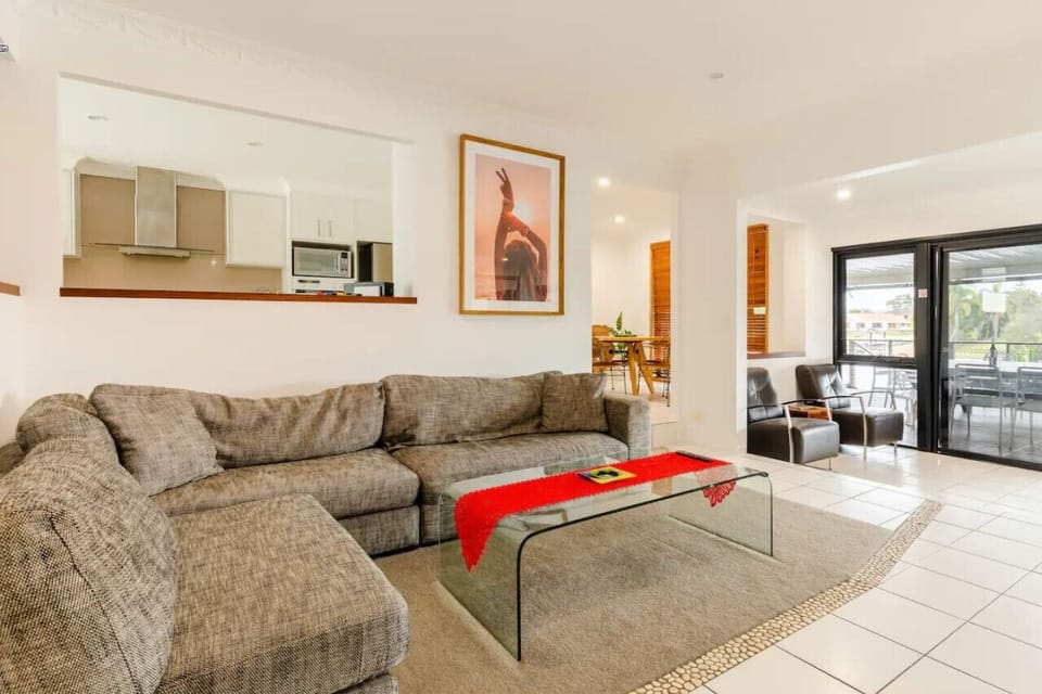 Living, dining, kitchen with views over the water. Air-con. Two lounge rooms