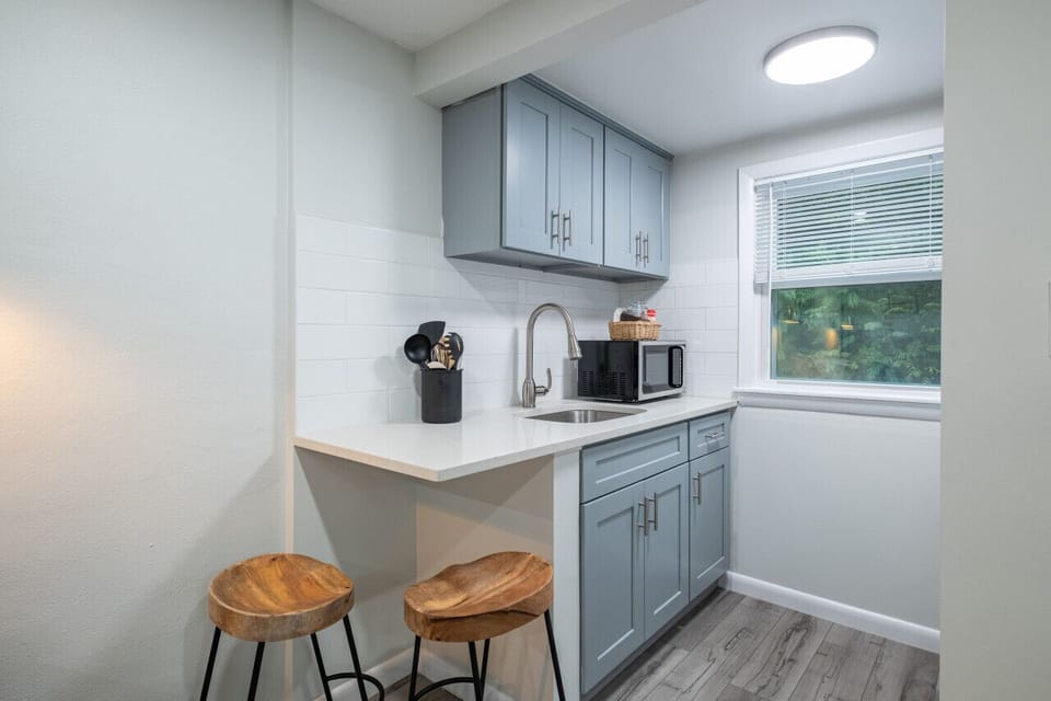 Small in size, big on function. Our fully equipped kitchen features space-saving appliances and all the essentials needed to whip up a gourmet meal