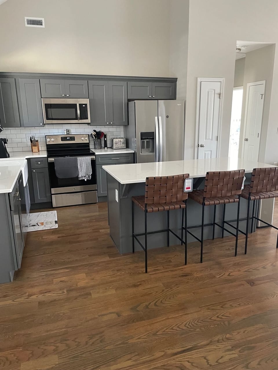 Well stocked kitchen with bar seating