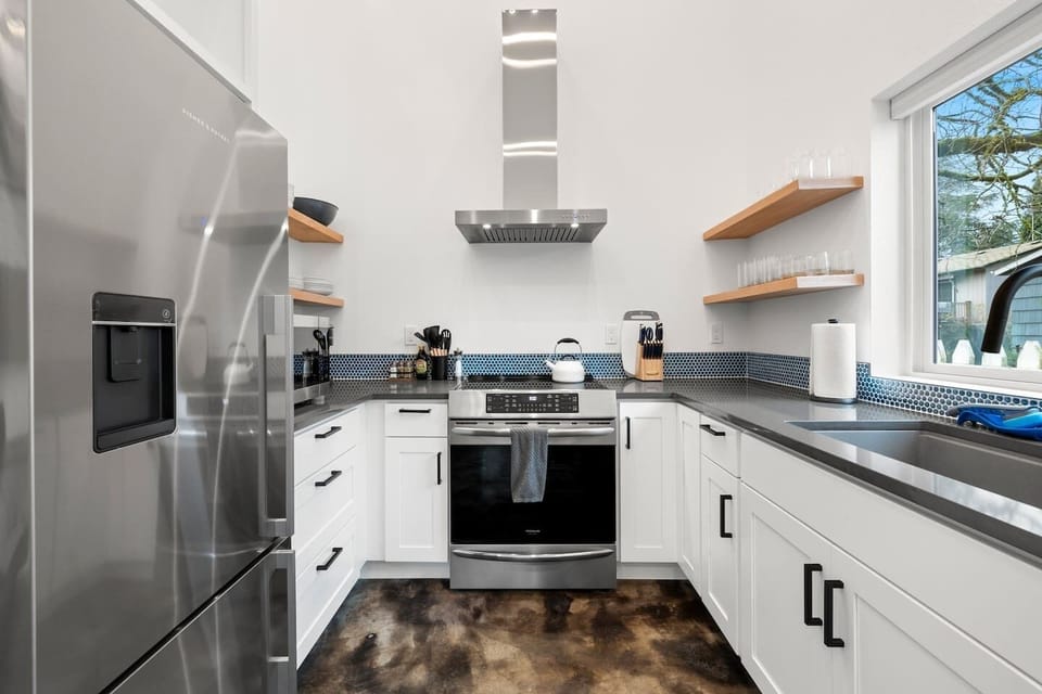 Fully equipped kitchen with coffee bar.