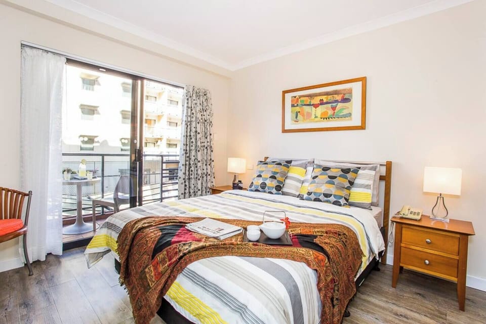 Bright and airy bedroom with a balcony