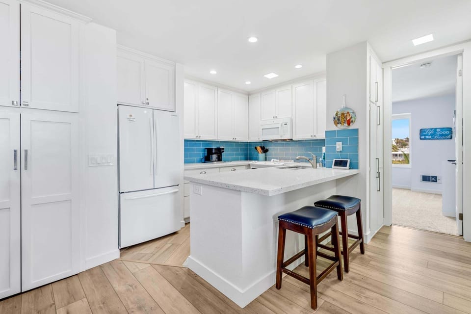 Whip up coastal feast in our fully-equipped kitchen, where function meets style.