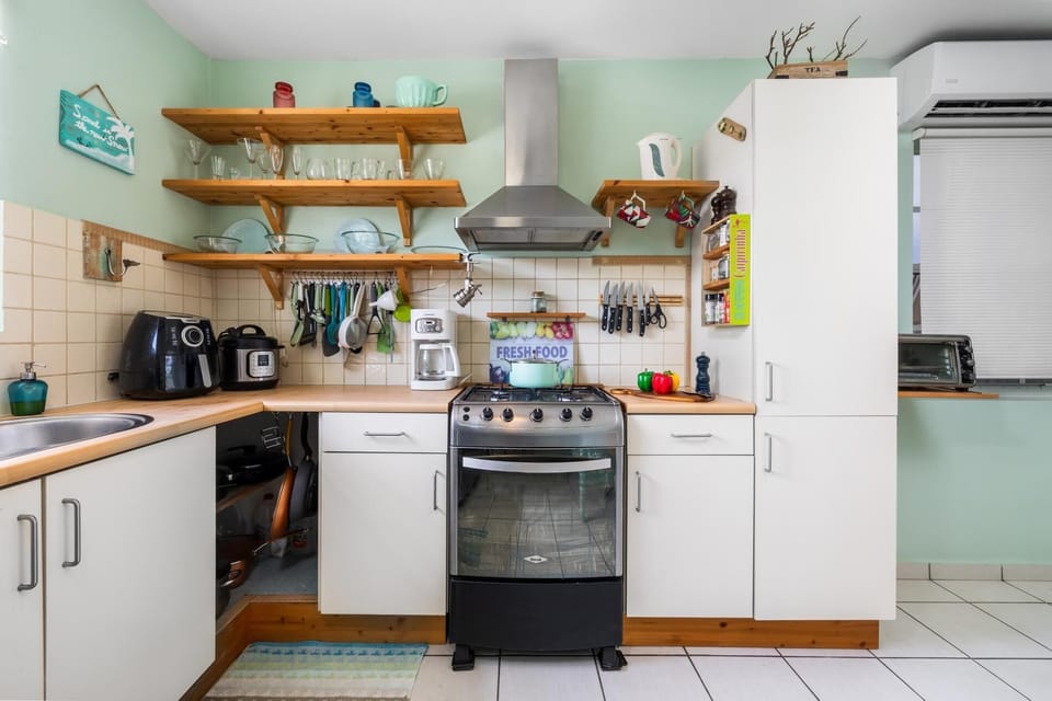 Heart of the home: Gather, cook, and create unforgettable memories in our welcoming kitchen, where every dish is made with love
