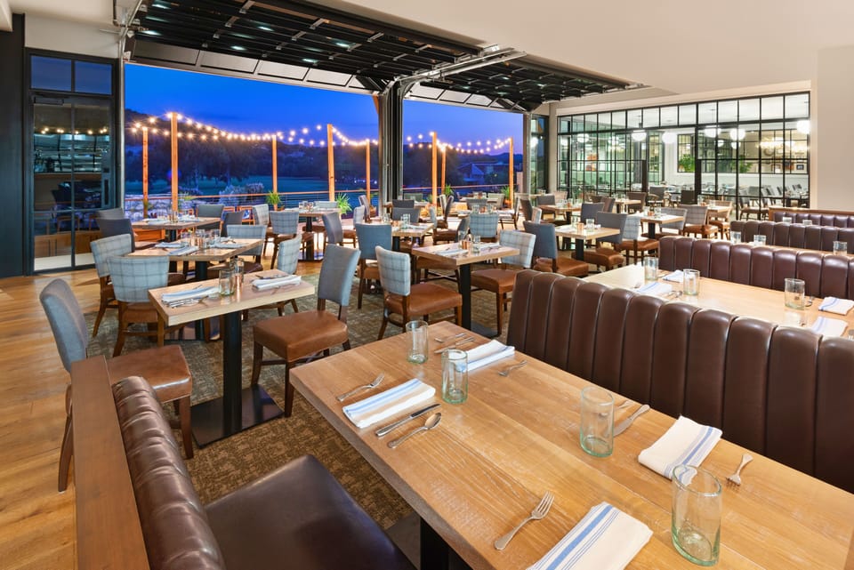 Savor sunset dinners in a bright, open-air dining room.