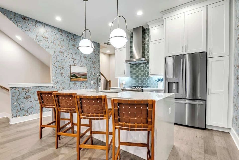The kitchen is a great space to make meals and stay in for a movie night or to make the perfect Music City cocktail before walking over to Geodis Park to catch a concert.