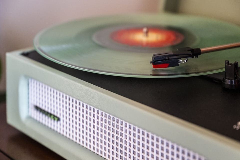 Record player nestled in the dining room to enjoy your favorite vinyl.  