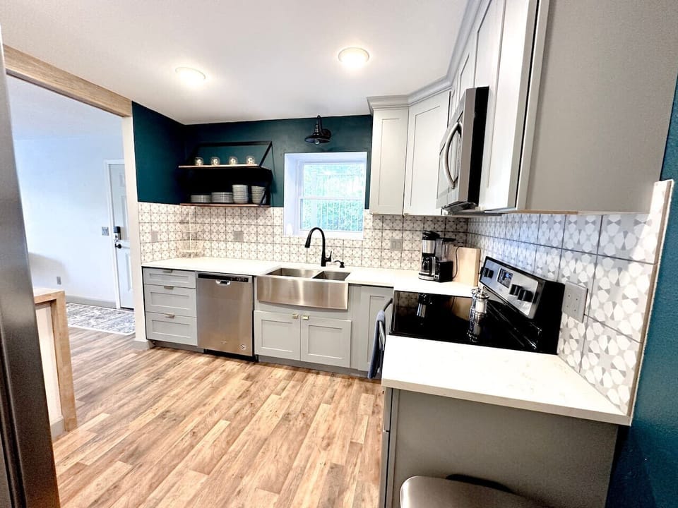Step into convenience with a fully equipped kitchen in this stylish condo! Perfect for home-cooked meals or quick bites, featuring all the essentials to make your stay comfortable and delicious.