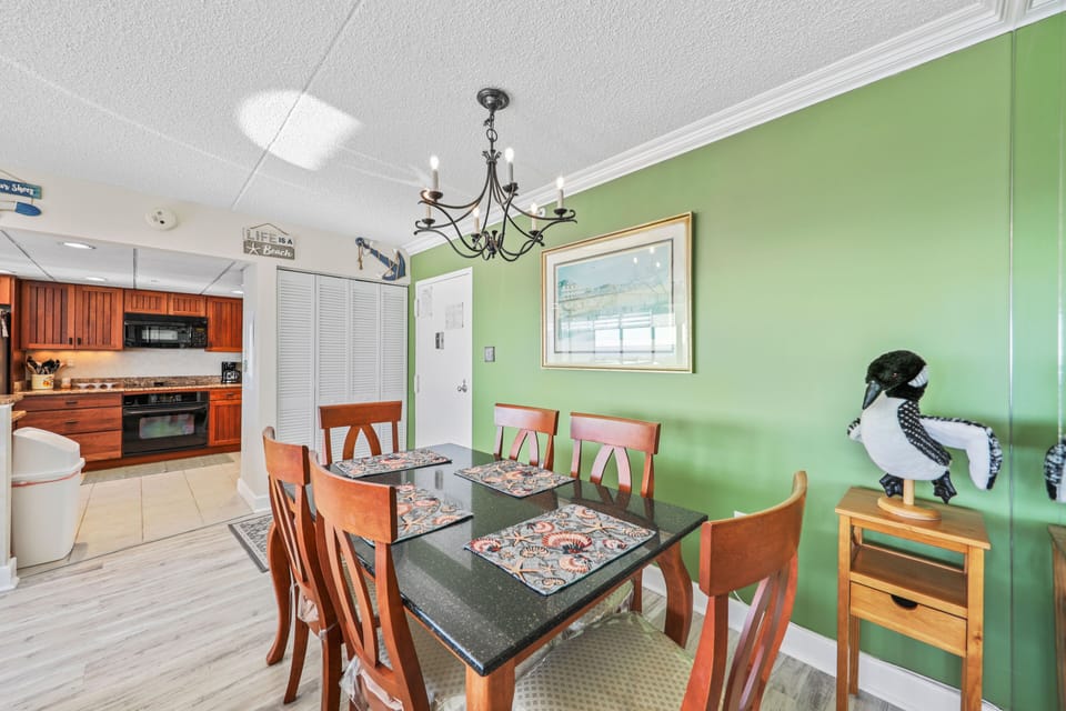 Dining Area opens to gorgeous Well-Stocked Kitchen.