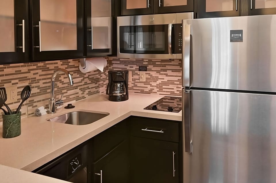 Cook and store essentials easily with full-size fridge convenience.