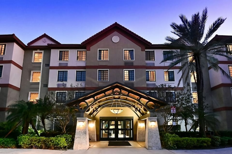 Arrive to a warmly lit entrance after a full day.