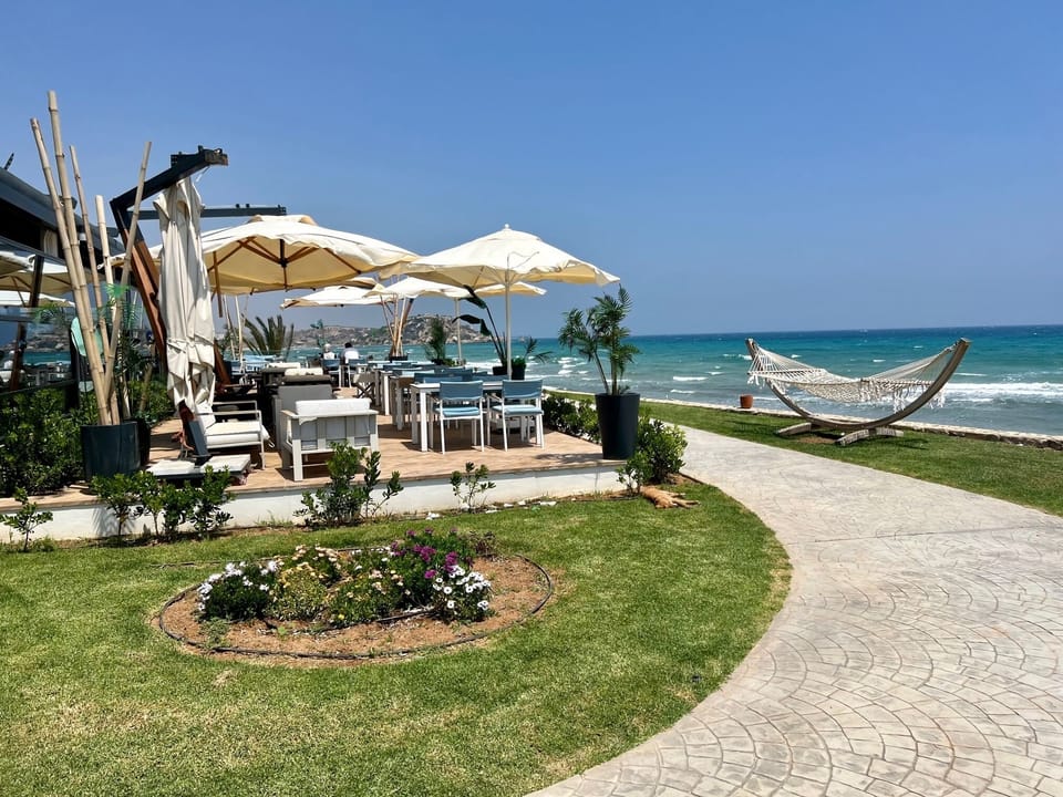 Residential industry's own beach. apartment complex restaurant terrace.