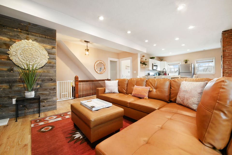 Featuring our living room sofa seating with bright and airy set up.