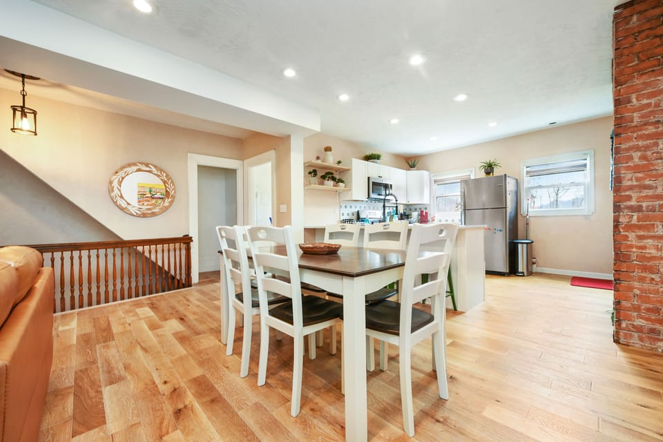 Dining area seats 6—perfect for shared meals & family moments.