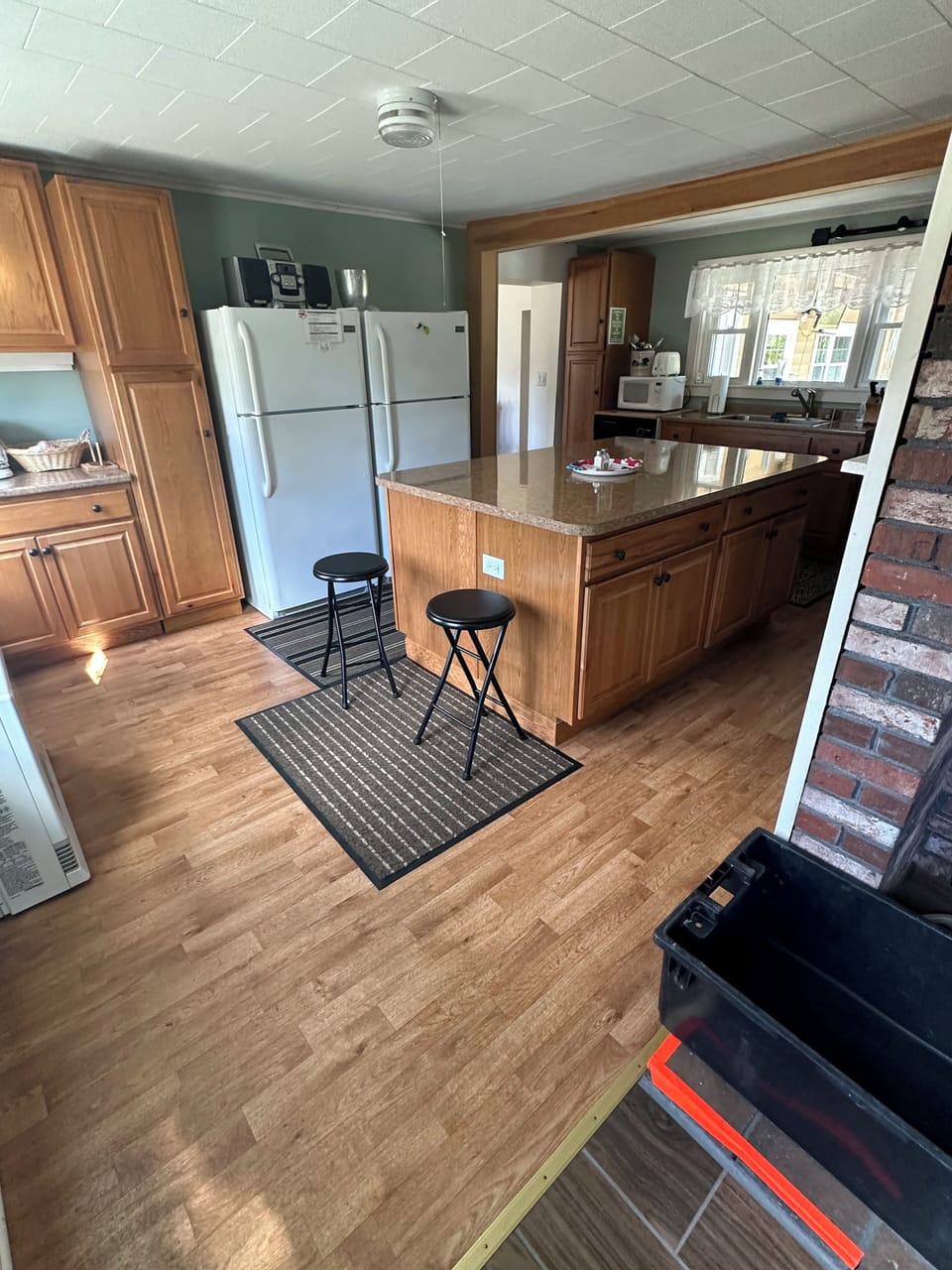 Kitchen with Side x Side Fridges.