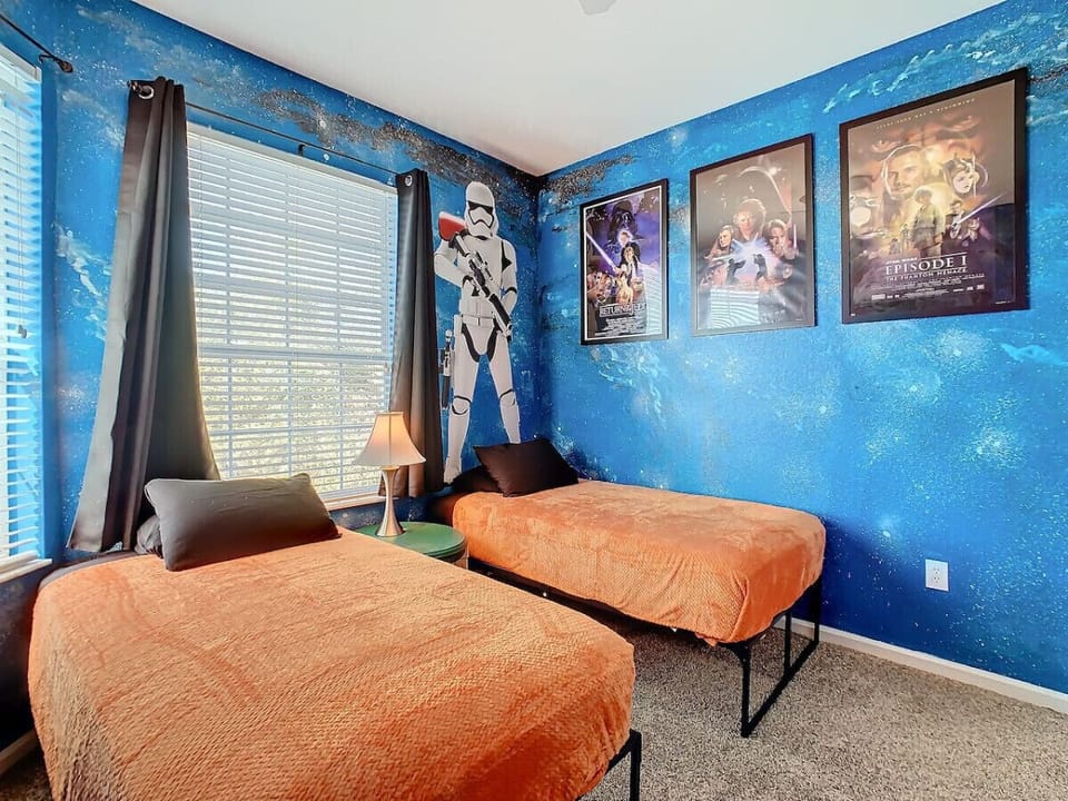 Star Wars room with 2 twin beds, designed for young adventurers and Jedi dreams!
