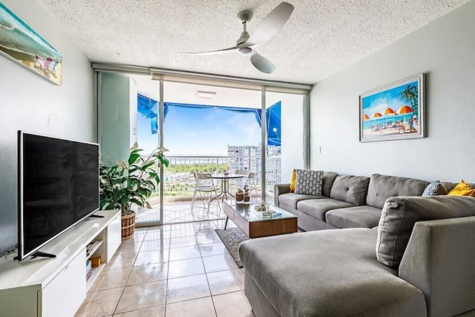 Expansive living room with new sliding doors that open fully for OPEN layout!