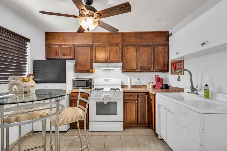 Wake up to coffee in this bright and welcoming kitchen space.